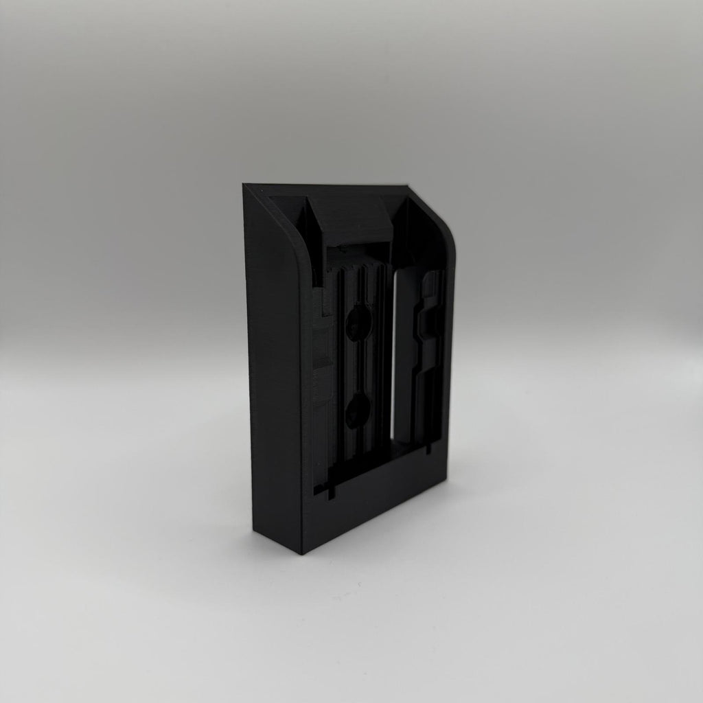 Black VanMount wall mount for DeWalt 18V XR batteries